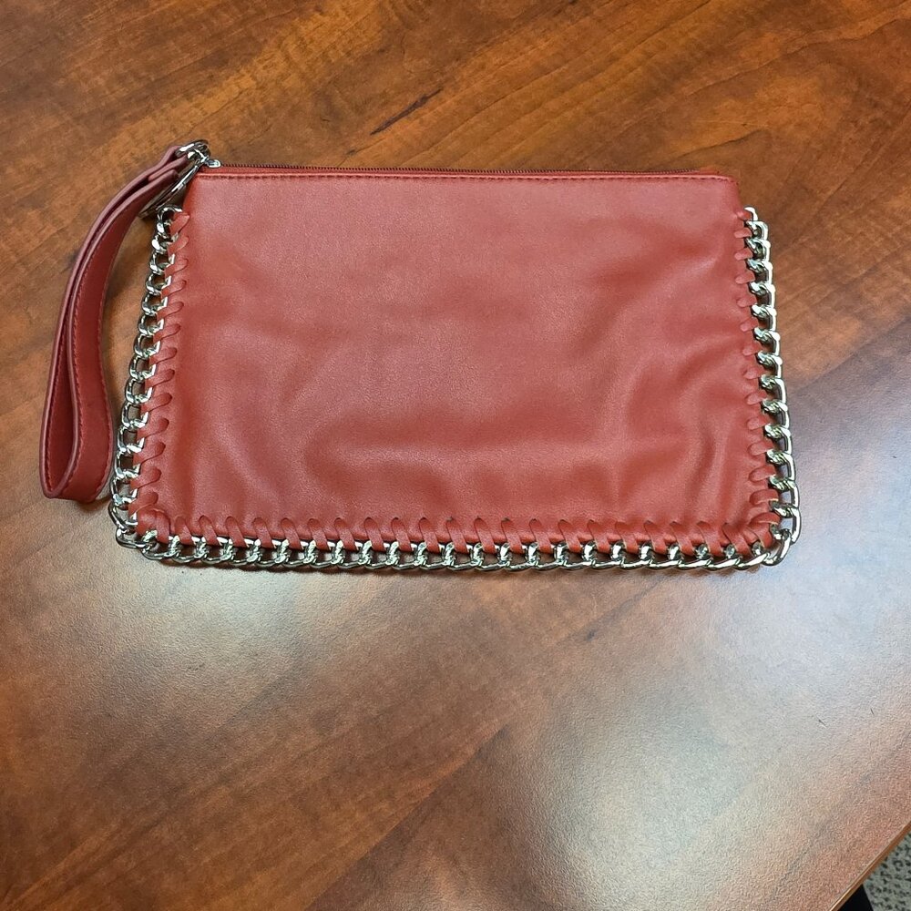 Carlos by Carlos Santana Black Clutch Wristlet with Silver Chain Detail.